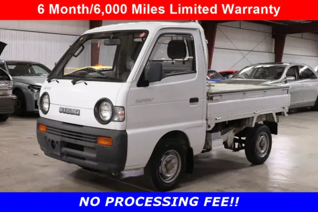 White 1991 Suzuki Carry Dump Bed 4x4 Kei Truck, front three-quarter view, for sale at Duncan Imports in Christiansburg, VA