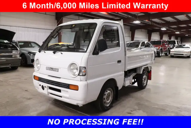 White 1993 Suzuki Carry 4x4 Kei Truck, front three-quarter view, for sale at Duncan Imports in Christiansburg, VA
