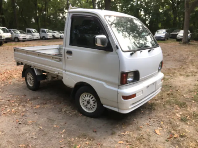 1996 Mitsubishi Minicab 4x4 Kei Truck, front three-quarter view, for sale at Fun Karz in North Little Rock, AR