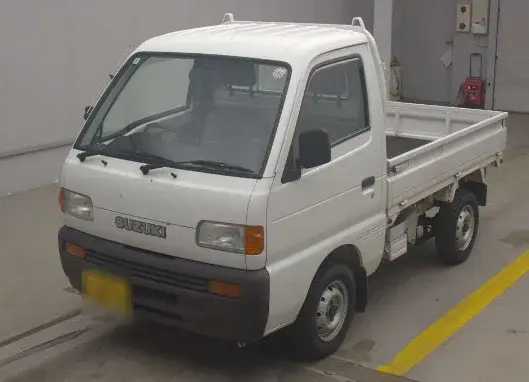 1997 Suzuki Carry 4WD Dump Truck, a white off-road Kei Truck, for sale at Weatherford Mini Trucks in Weatherford, TX