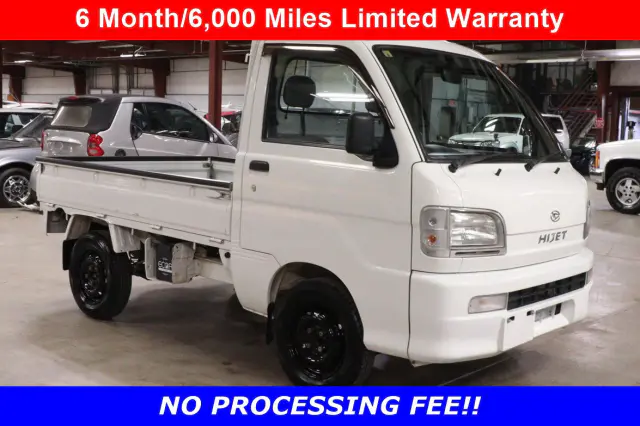 White 1999 Daihatsu Hijet 4x4 Kei Truck, front three-quarter view, for sale at Duncan Imports in Christiansburg, VA