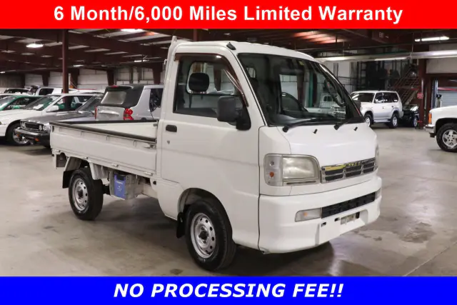White 1999 Daihatsu Hijet 4x4 Kei Truck, front three-quarter view, for sale at Duncan Imports in Christiansburg, VA