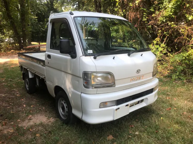 1999 Daihatsu Hijet 4x4 Kei Truck, front three-quarter view, for sale at Fun Karz in North Little Rock, AR