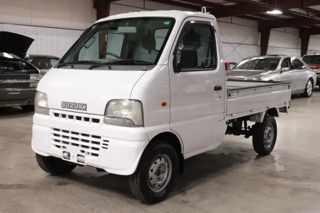 2001 Suzuki Carry 4x4 Kei Truck, front three-quarter view, for sale at Duncan Imports in Christiansburg, VA