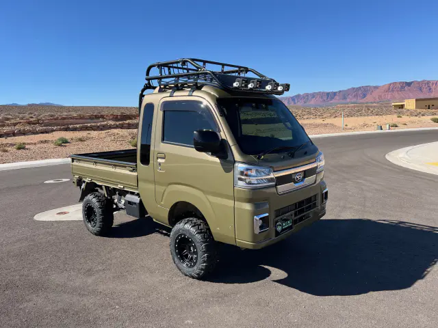 2022 Daihatsu Hijet Extreme, a green off-road Kei Truck, for sale at Mini Monsters USA in St. George, UT