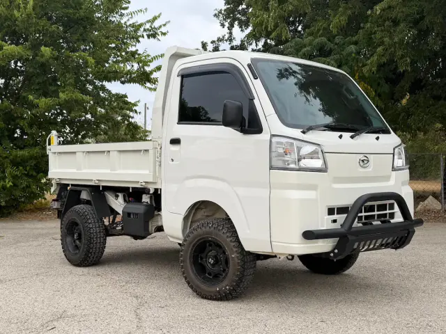 2022 Daihatsu Hijet HD Dump, a white off-road Kei Truck, for sale at Weatherford Mini Trucks in Weatherford, TX