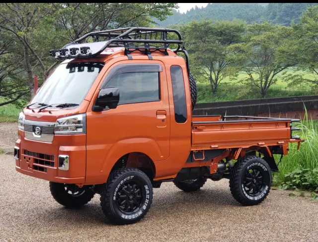 2022 Daihatsu Hijet Jumbo Extreme, a desert orange off-road Kei Truck, for sale at Mini Monsters USA in St. George, UT