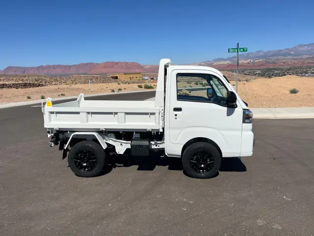 2024 Daihatsu Hijet HD Dump, a whiteout off-road Kei Truck, for sale at Mini Monsters USA in St. George, UT