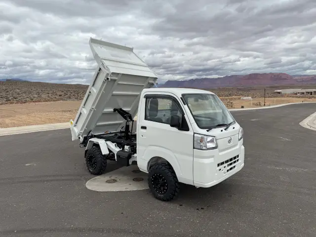 2024 Daihatsu Hijet HD Dump, a whiteout off-road Kei Truck, for sale at Mini Monsters USA in St. George, UT