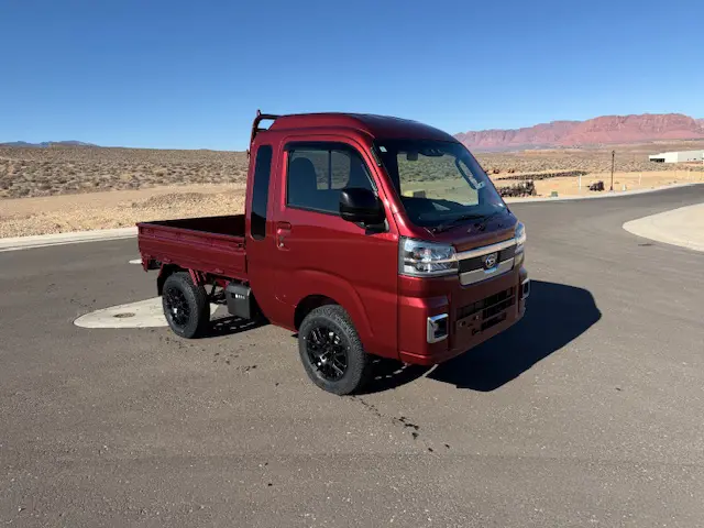 2024 Daihatsu Hijet Jumbo, a red off-road Kei Truck, for sale at Mini Monsters USA in St. George, UT