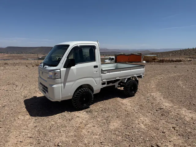 2024 Daihatsu Hijet, a whiteout off-road Kei Truck, for sale at Mini Monsters USA in St. George, UT