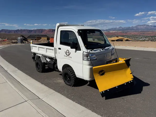 2025 Daihatsu Hijet HD Dump, a whiteout off-road Kei Truck, for sale at Mini Monsters USA in St. George, UT