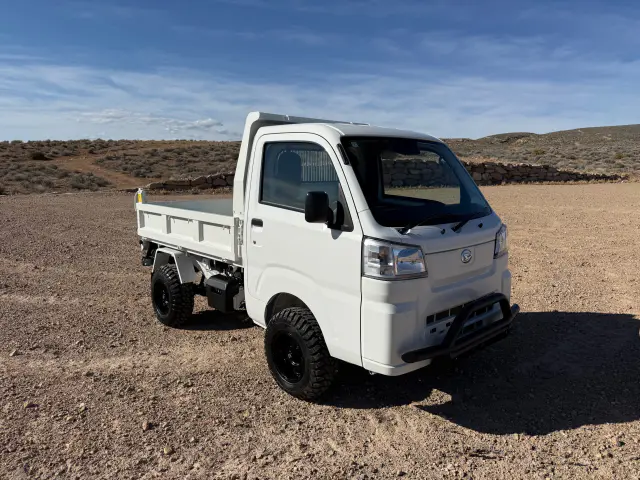 2025 Daihatsu Hijet HD Dump, a whiteout off-road Kei Truck, for sale at Mini Monsters USA in St. George, UT