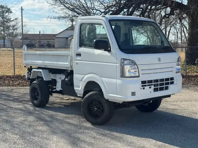 2025 Suzuki Carry Scissor/Dump Bed, a white off-road Kei Truck, for sale at Weatherford Mini Trucks in Weatherford, TX