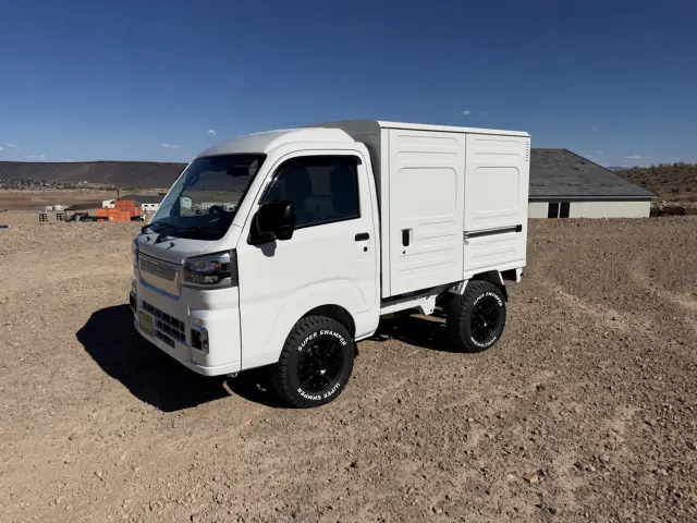 2026 Daihatsu Hijet Box Truck, a white off-road Kei Truck, for sale at Mini Monsters USA in St. George, UT