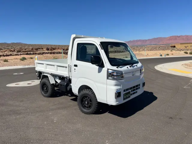 2026 Daihatsu Hijet HD Dump, a white off-road Kei Truck, for sale at Mini Monsters USA in St. George, UT